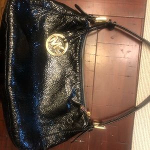 Black patent MK satchel purse.